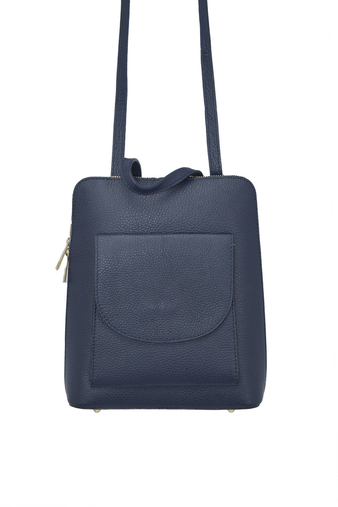 Navy Blue 3 in 1 grainy leather backpack and cross body daypack with three external zip compartments, two are front facing with one on the back, and one internal zip pocket. This backpack can be turned into a cross body bag or handbag, the straps are adjustable