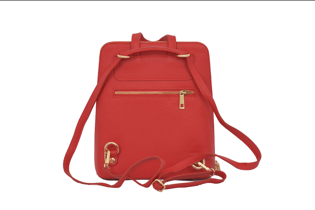 Red 3 in 1 grainy leather backpack and cross body daypack with three external zip compartments, two are front facing with one on the back, and one internal zip pocket. This backpack can be turned into a cross body bag or handbag, the straps are adjustable