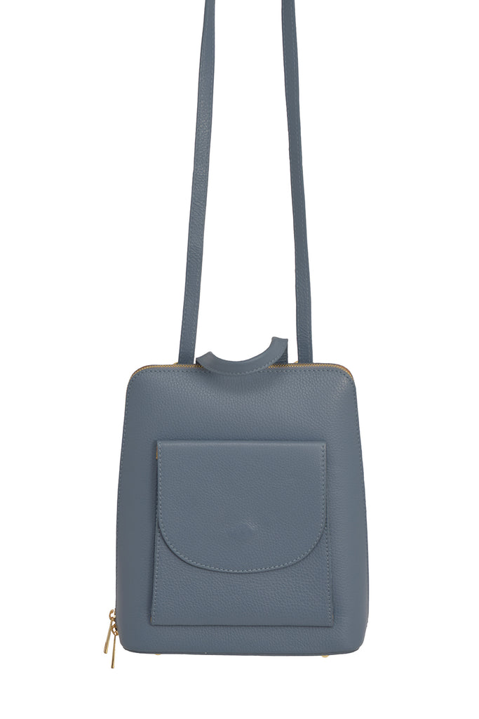 Denim Blue 3 in 1 grainy leather backpack and cross body daypack with three external zip compartments, two are front facing with one on the back, and one internal zip pocket. This backpack can be turned into a cross body bag or handbag, the straps are adjustable