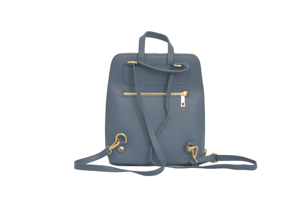 Denim Blue 3 in 1 grainy leather backpack and cross body daypack with three external zip compartments, two are front facing with one on the back, and one internal zip pocket. This backpack can be turned into a cross body bag or handbag, the straps are adjustable