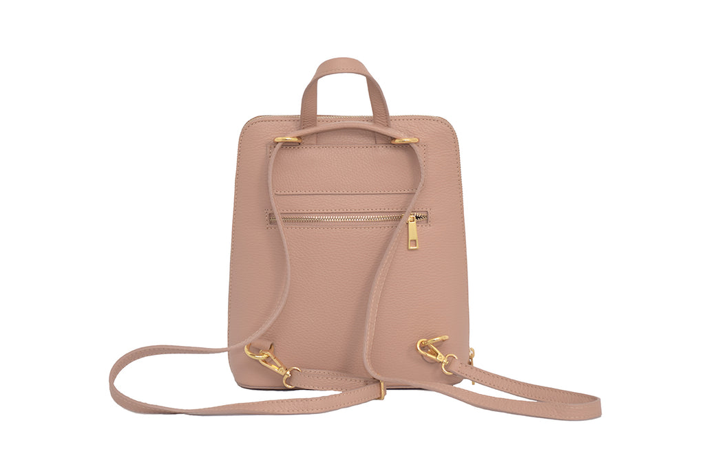 Pink 3 in 1 grainy leather backpack and cross body daypack with three external zip compartments, two are front facing with one on the back, and one internal zip pocket. This backpack can be turned into a cross body bag or handbag, the straps are adjustable