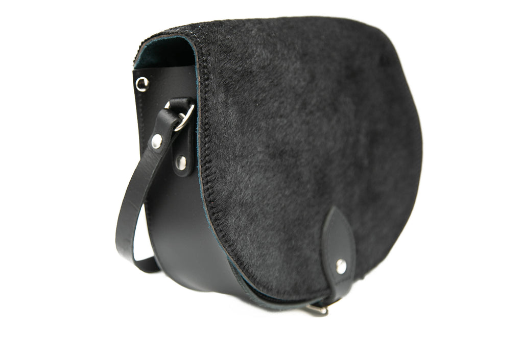Black  cowhide hair Leather handmade saddle cross body handbag with adjustable belt buckle shoulder strap, made in London - A to Z Leather LTD