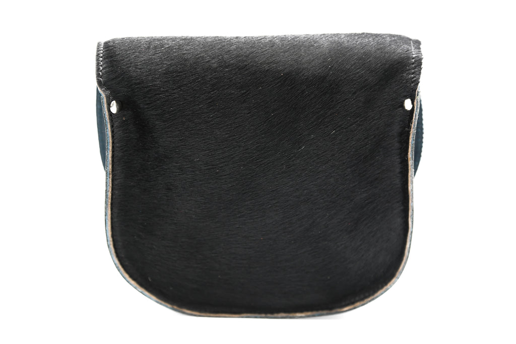 Black  cowhide hair Leather handmade saddle cross body handbag with adjustable belt buckle shoulder strap, made in London. Visit out customise section to choose your own colours and have a bespoke custom saddle bag made for you.  A to Z Leather LTD 