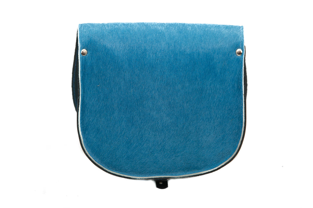 Teal Blue cowhide hair Leather handmade saddle cross body handbag with adjustable belt buckle shoulder strap, made in London. Visit out customise section to choose your own colours and have a bespoke custom saddle bag made for you. A to Z Leather LTD