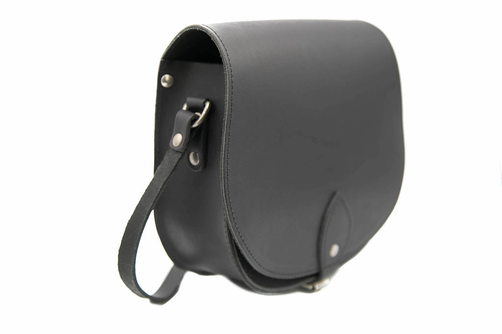 Matt Black Leather handmade saddle cross body handbag with adjustable belt buckle shoulder strap, made in London. Visit out customise section to choose your own colours and have a bespoke custom saddle bag made for you. A to Z Leather LTD