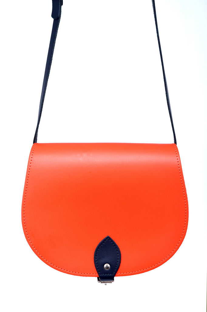 Orange and Navy Leather handmade saddle cross body handbag with adjustable belt buckle shoulder strap, made in London. Visit out customise section to choose your own colours and have a bespoke custom saddle bag made for you. A to Z Leather LTD