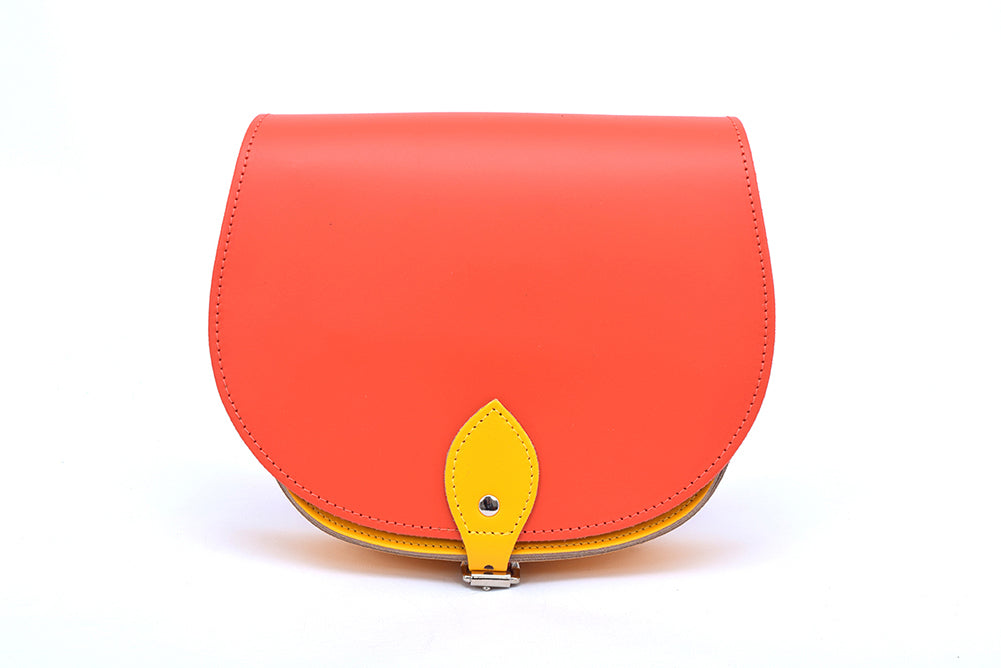 Orange and Yellow Leather handmade saddle cross body handbag with adjustable belt buckle shoulder strap, made in London. Visit out customise section to choose your own colours and have a bespoke custom saddle bag made for you. A to Z Leather LTD