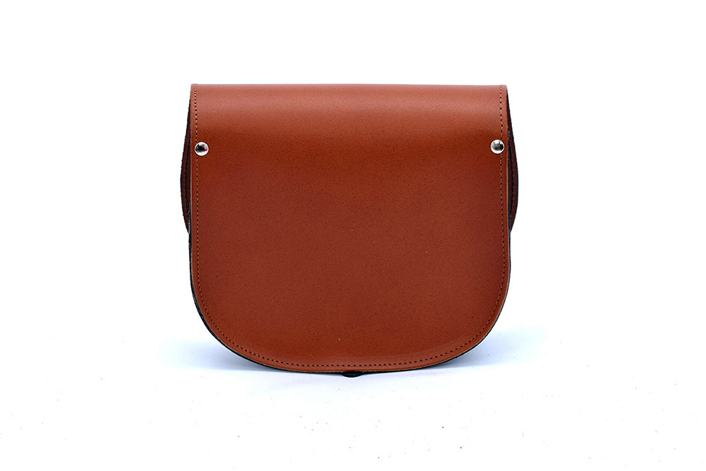 Tan and Black Leather handmade saddle cross body handbag with adjustable belt buckle shoulder strap, made in London. Visit out customise section to choose your own colours and have a bespoke custom saddle bag made for you. A to Z Leather LTD