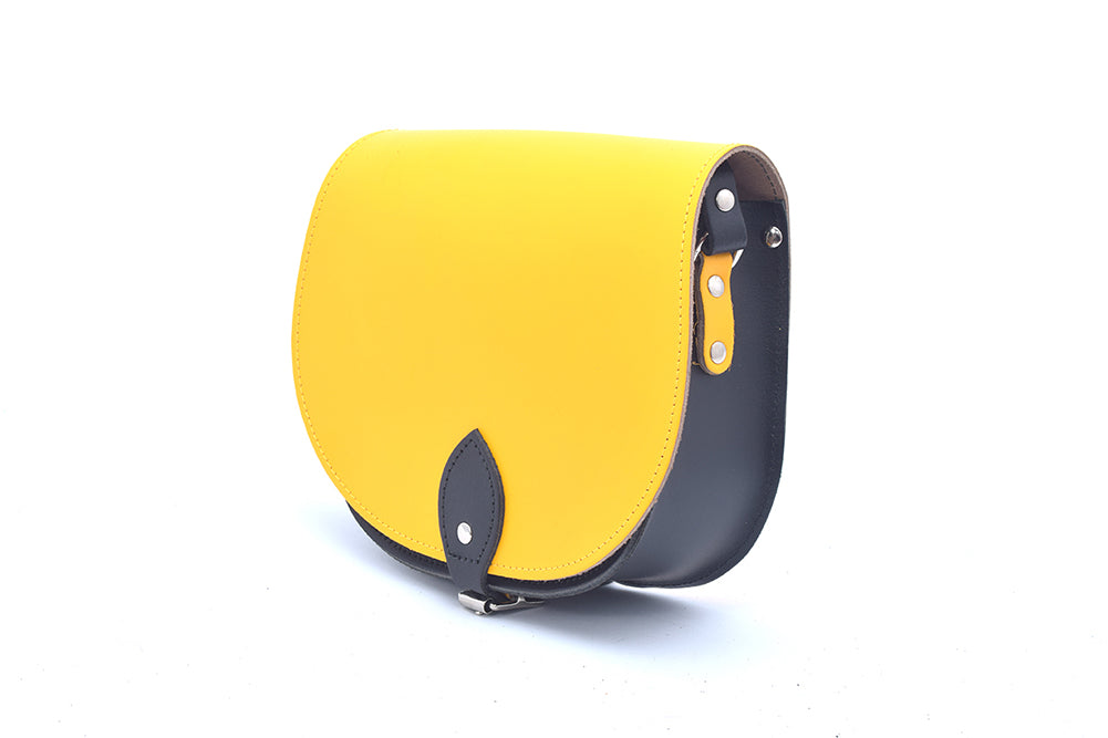 Yellow and Black Leather handmade saddle cross body handbag with adjustable belt buckle shoulder strap, made in London. Visit out customise section to choose your own colours and have a bespoke custom saddle bag made for you. A to Z Leather LTD
