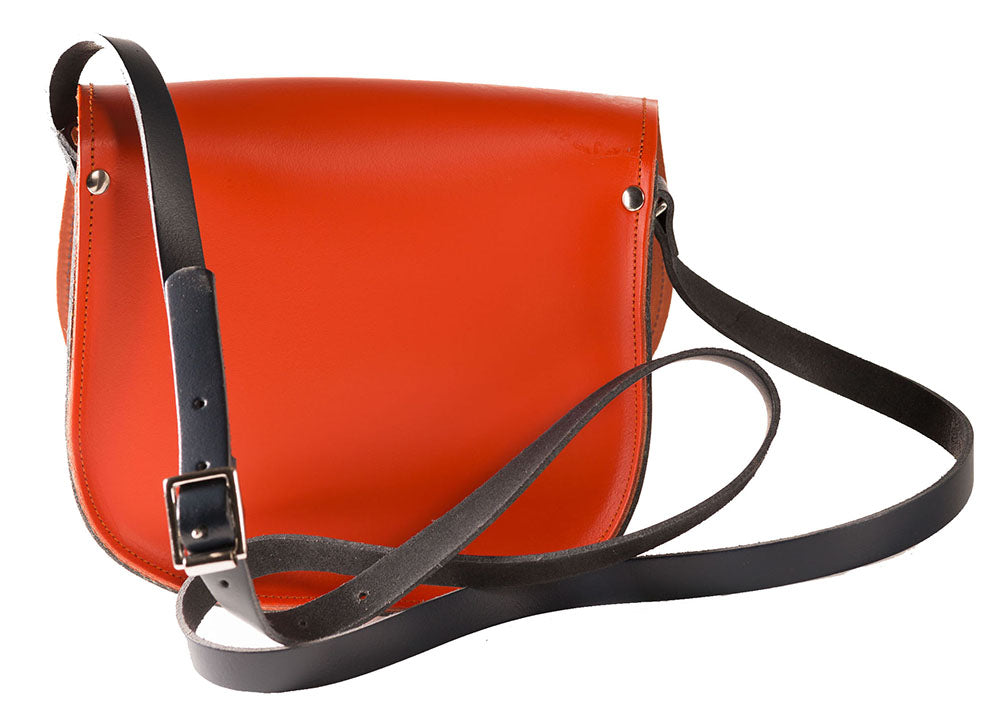 Orange and Black Leather handmade saddle cross body handbag with adjustable belt buckle shoulder strap, made in London. Visit out customise section to choose your own colours and have a bespoke custom saddle bag made for you. A to Z Leather LTD