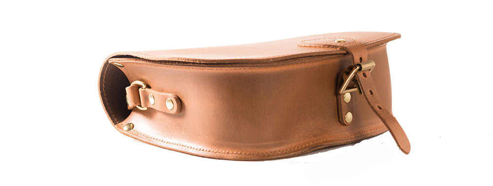 vintage tan Leather handmade saddle cross body handbag with adjustable belt buckle shoulder strap, made in London. Visit out customise section to choose your own colours and have a bespoke custom saddle bag made for you. A to Z Leather LTD