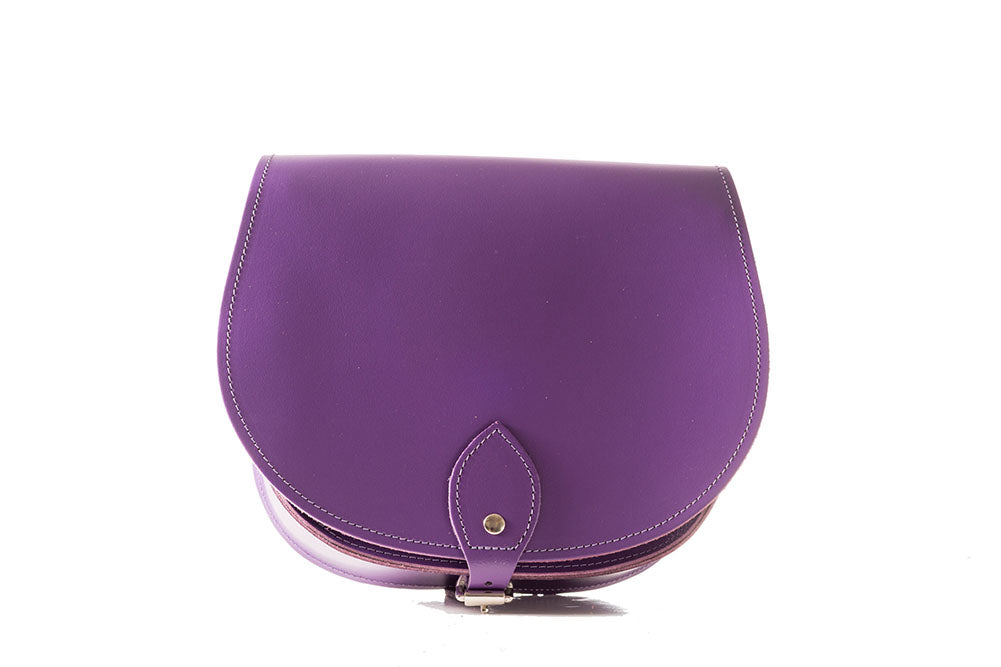 Purple Leather handmade saddle cross body handbag with adjustable belt buckle shoulder strap, made in London. Visit out customise section to choose your own colours and have a bespoke custom saddle bag made for you. A to Z Leather LTD