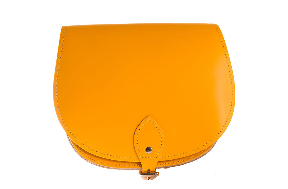 Yellow Leather handmade saddle cross body handbag with adjustable belt buckle shoulder strap, made in London. Visit out customise section to choose your own colours and have a bespoke custom saddle bag made for you. A to Z Leather LTD